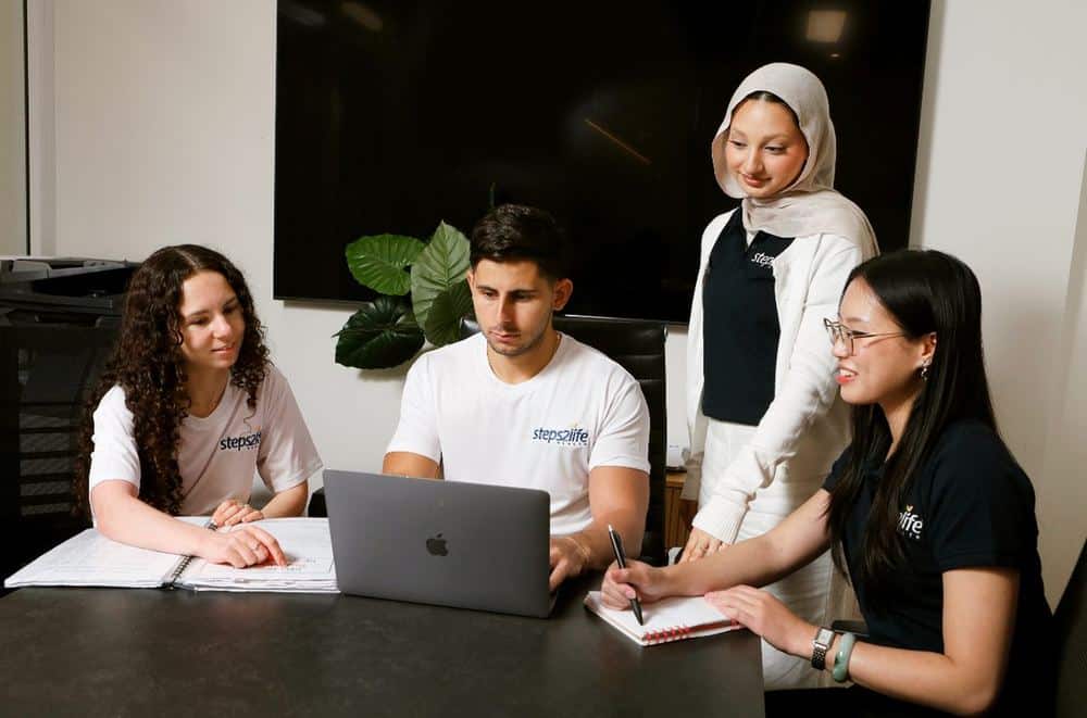 Steps2Life graduates collaborating on a clinical project